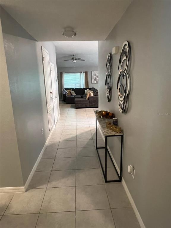 2489 Bulrush Drive St. Cloud, FL 34769 - Photo 5 of 22 a view of entryway with a window
