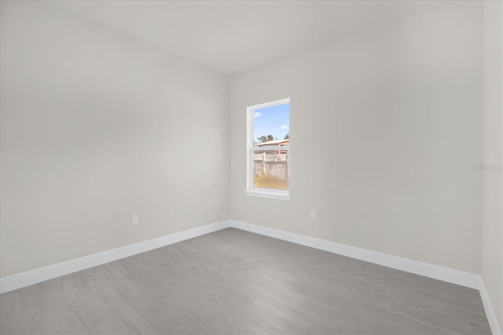 15782 Southwest 52nd Ave Road Ocala, FL 34473 - Photo 20 of 34 an empty room with a window
