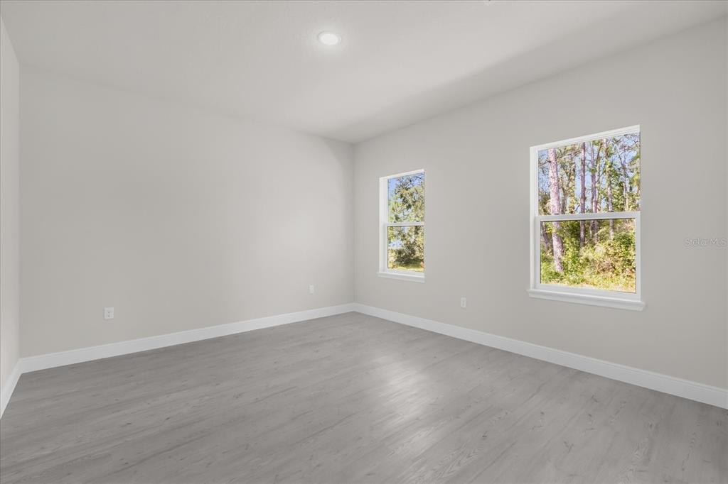 15782 Southwest 52nd Ave Road Ocala, FL 34473 - Photo 22 of 34 an empty room with windows