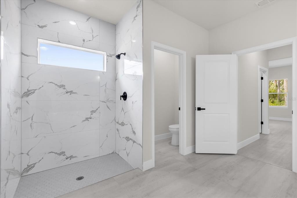 15782 Southwest 52nd Ave Road Ocala, FL 34473 - Photo 26 of 34 a view of bathroom with shower