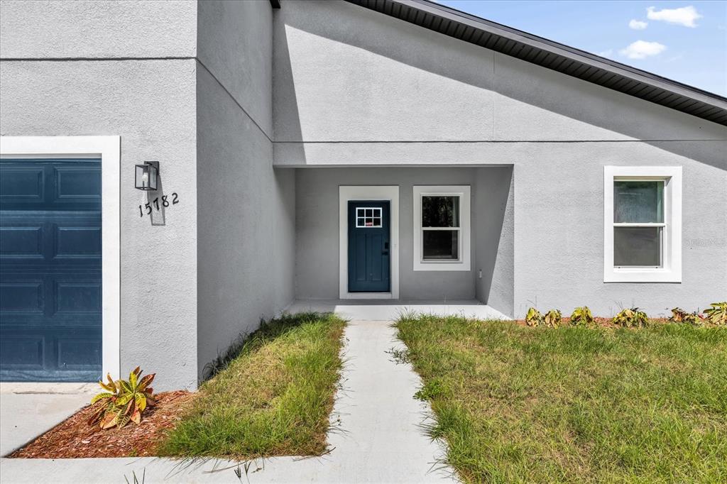 15782 Southwest 52nd Ave Road Ocala, FL 34473 - Photo 3 of 34 a front view of a house