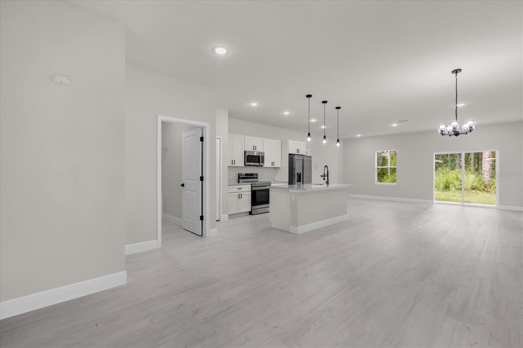 15782 Southwest 52nd Ave Road Ocala, FL 34473 - Photo 4 of 34 a view of a kitchen with a sink and a window