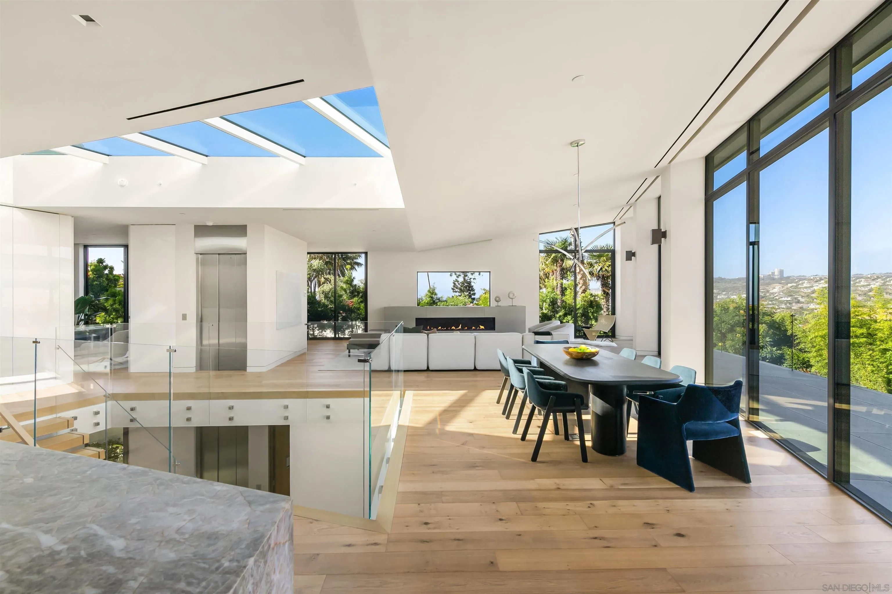 7837 Lookout Drive La Jolla, CA 92037 - Photo 16 of 46 a view of a living room and kitchen