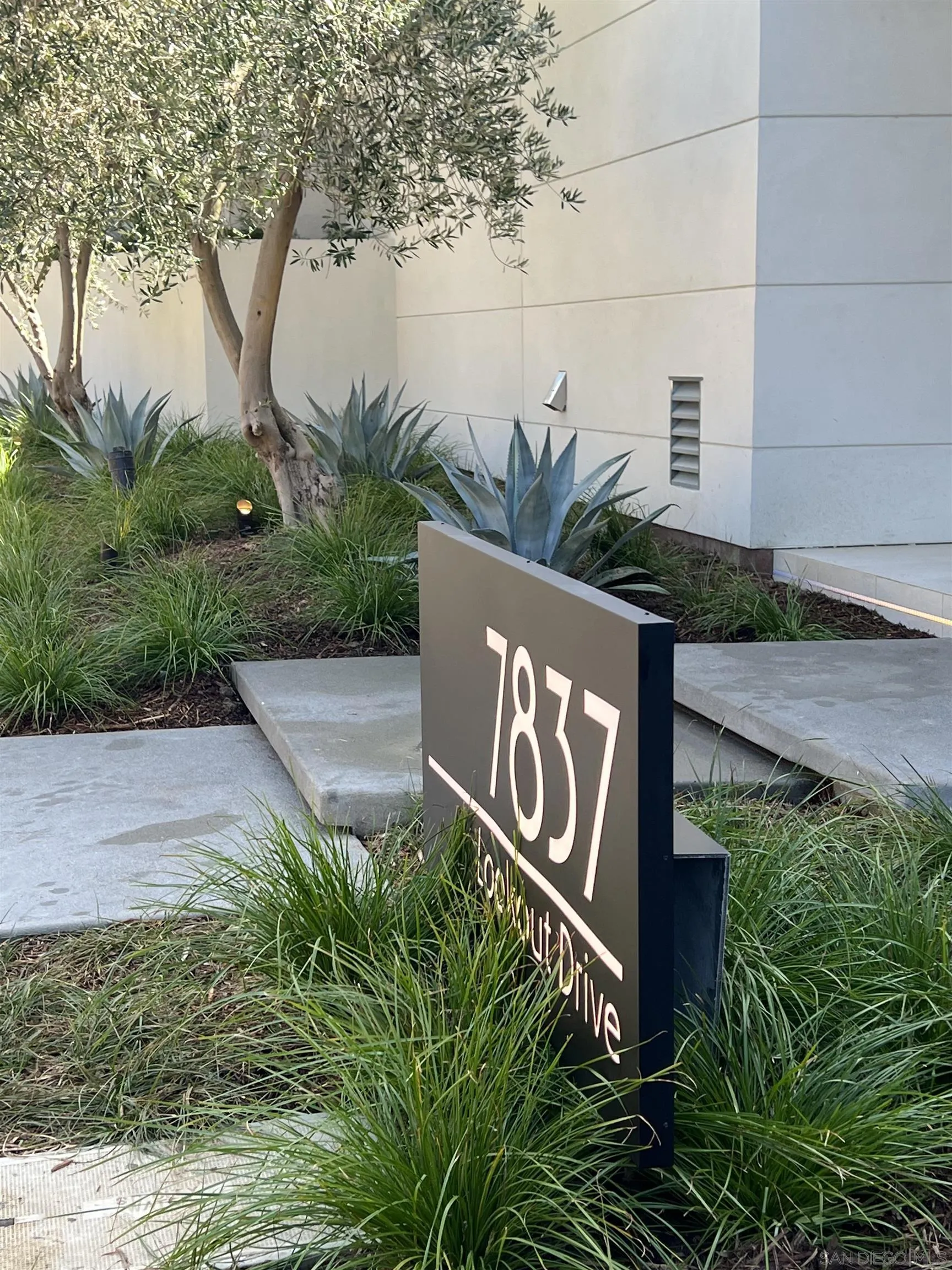 7837 Lookout Drive La Jolla, CA 92037 - Photo 2 of 46 a sign broad on the side of the road