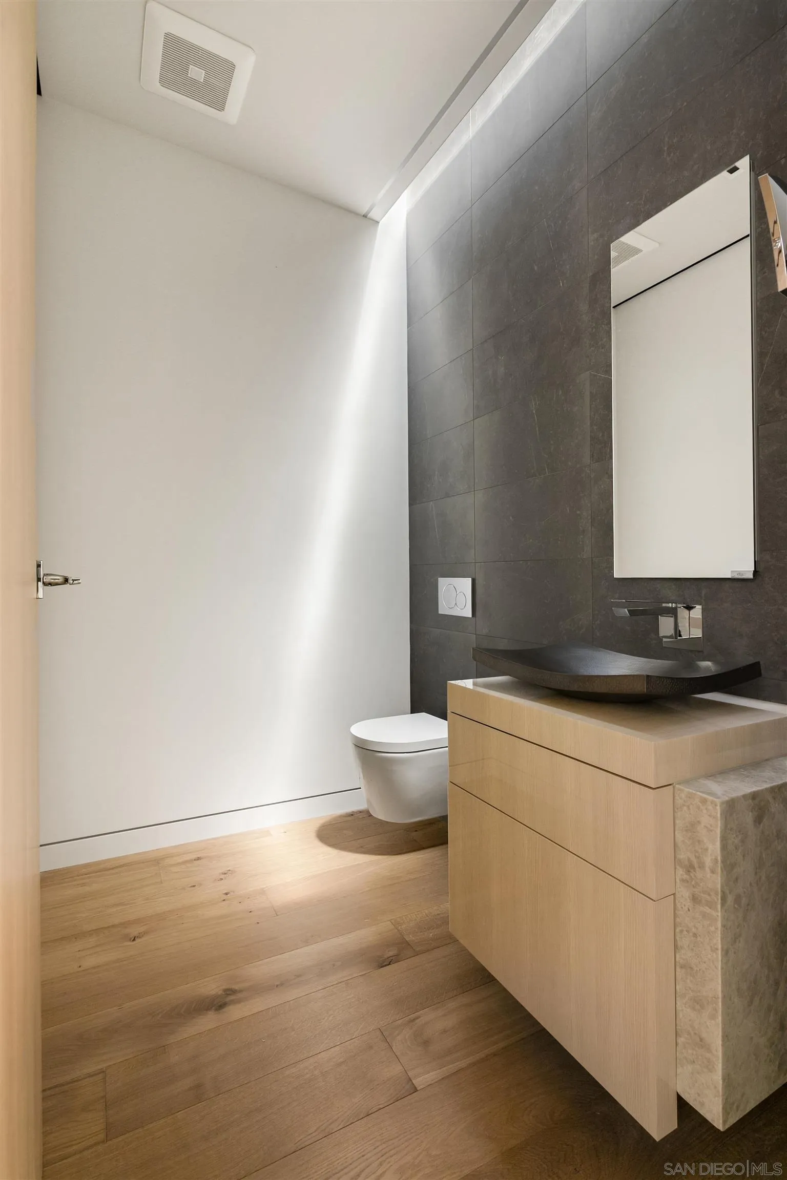 7837 Lookout Drive La Jolla, CA 92037 - Photo 25 of 46 a bathroom with a sink and a toilet