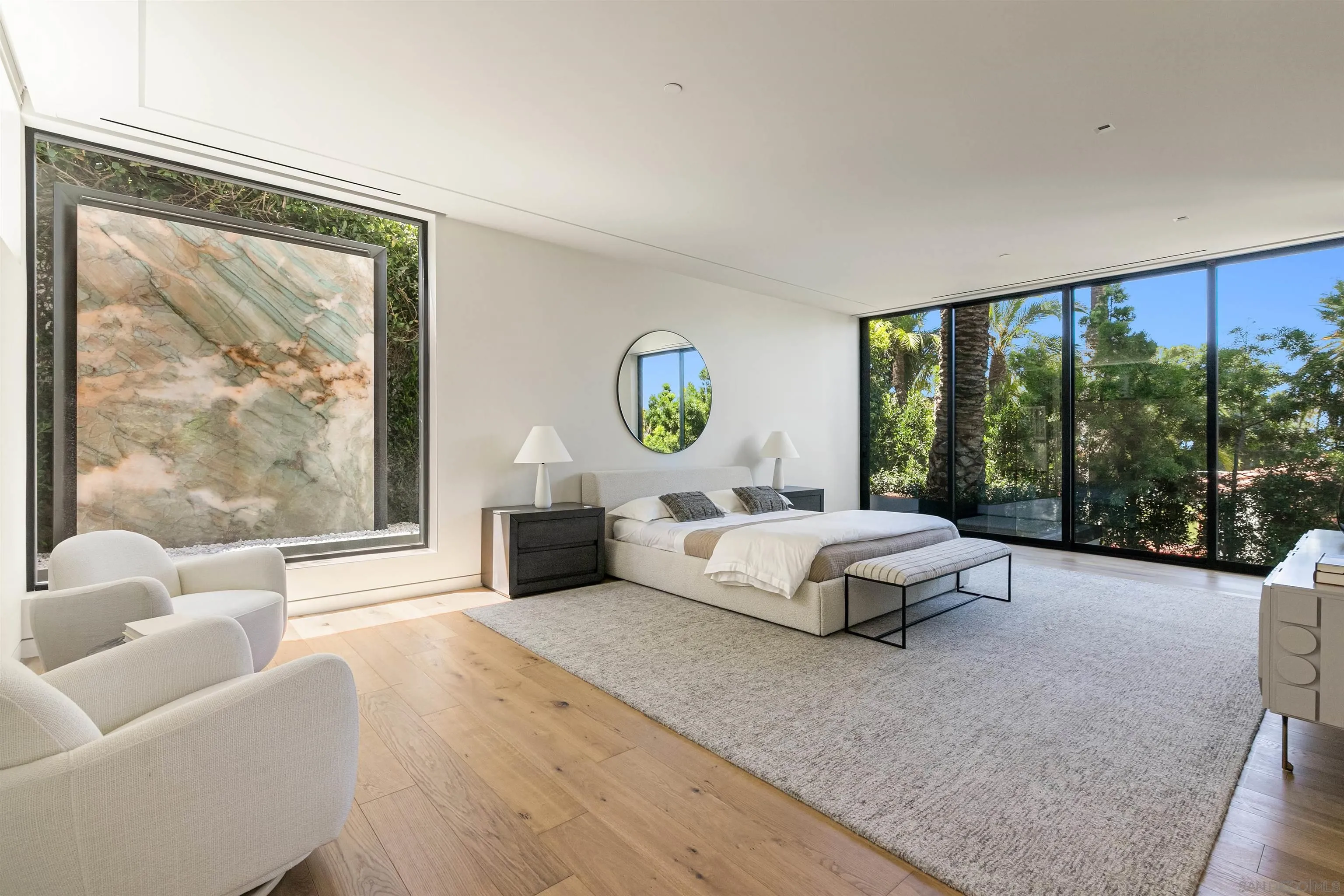 7837 Lookout Drive La Jolla, CA 92037 - Photo 31 of 46 a living room with furniture and a large window