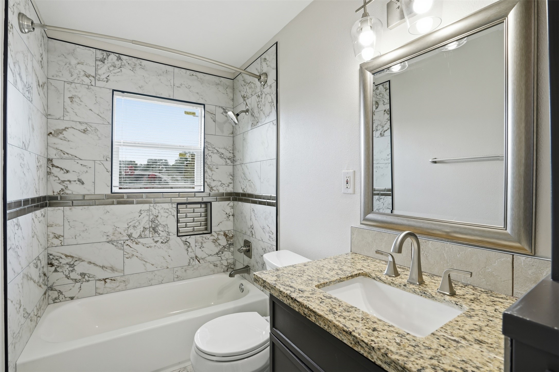 6518 Paris Street Houston, TX 77021 - Photo 16 of 23 a bathroom with a granite countertop sink toilet and shower