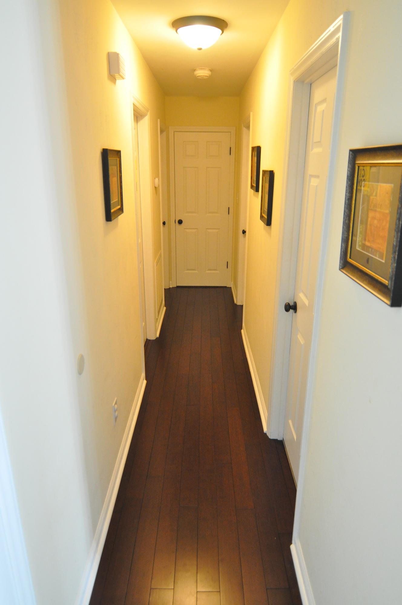 337 Fields Avenue Blue Ridge, VA 24064 - Photo 8 of 23 a view of a hallway with wooden floor