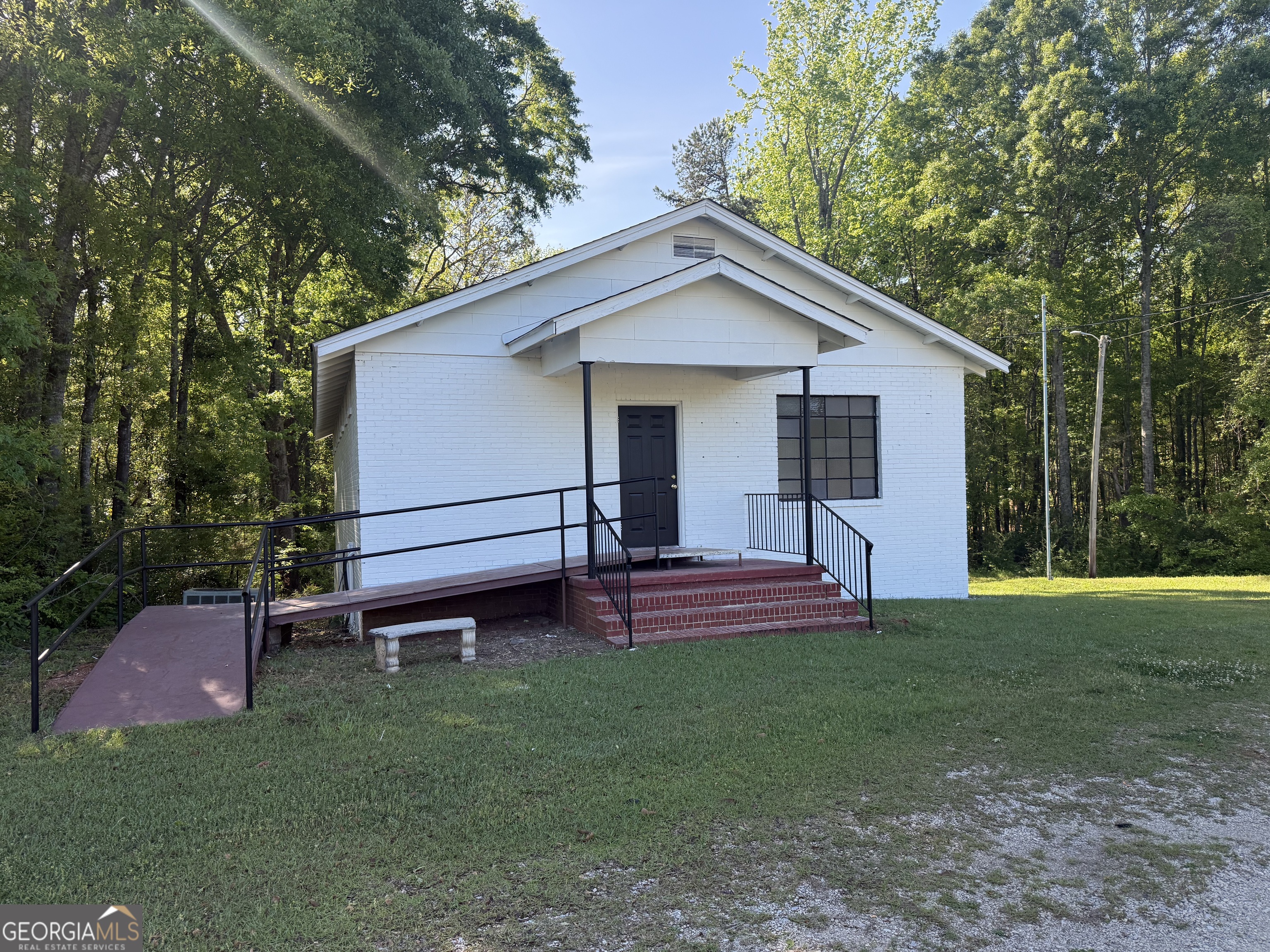 5047 West Point Road LaGrange, GA 30240 - Photo 2 of 22 a view of a house with a yard and sitting area