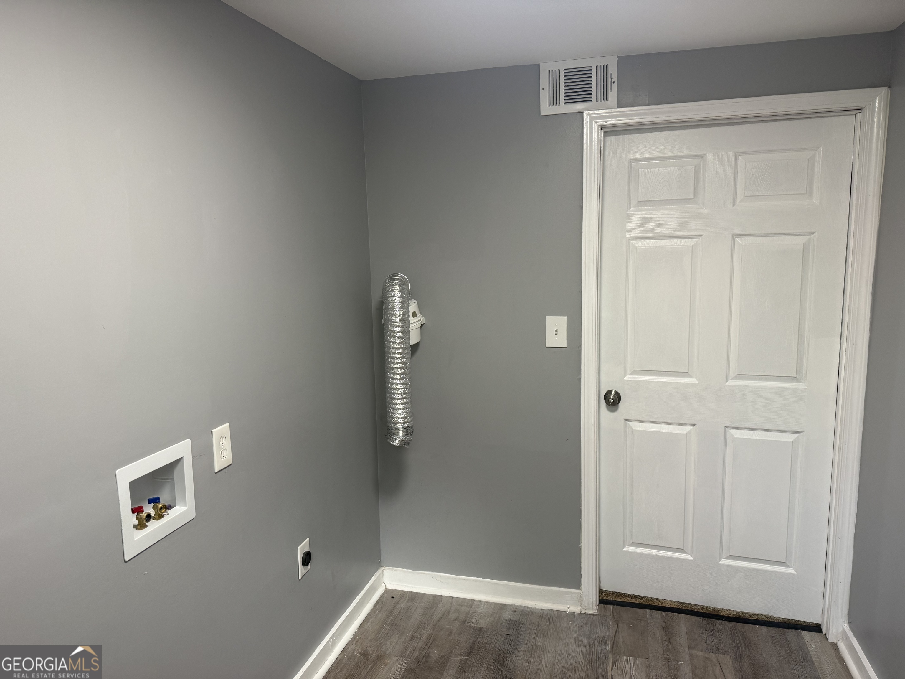 5047 West Point Road LaGrange, GA 30240 - Photo 6 of 22 wooden floor in an empty room