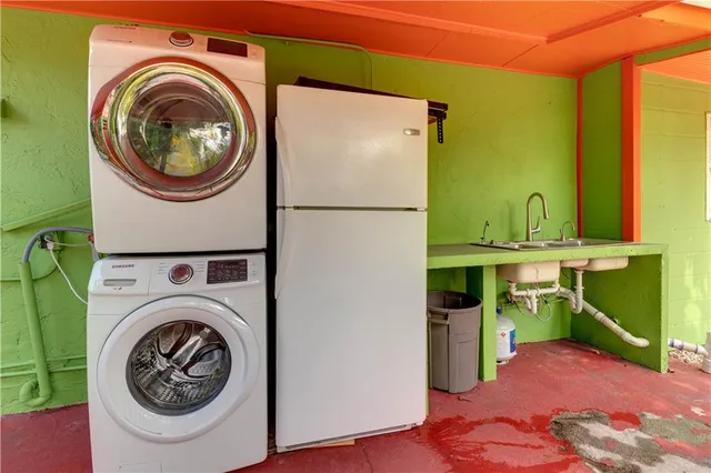 a backyard of a house with yard and outdoor seating