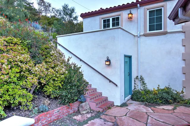 a backyard of a house with lots of green space
