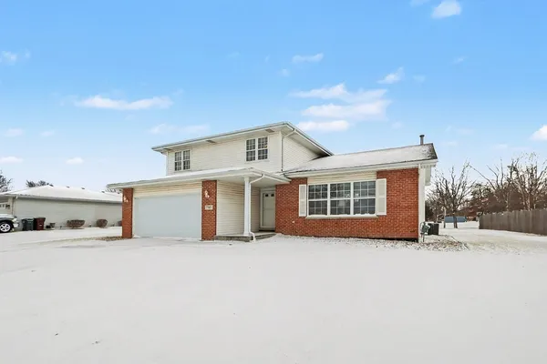 a view of a house with a big yard