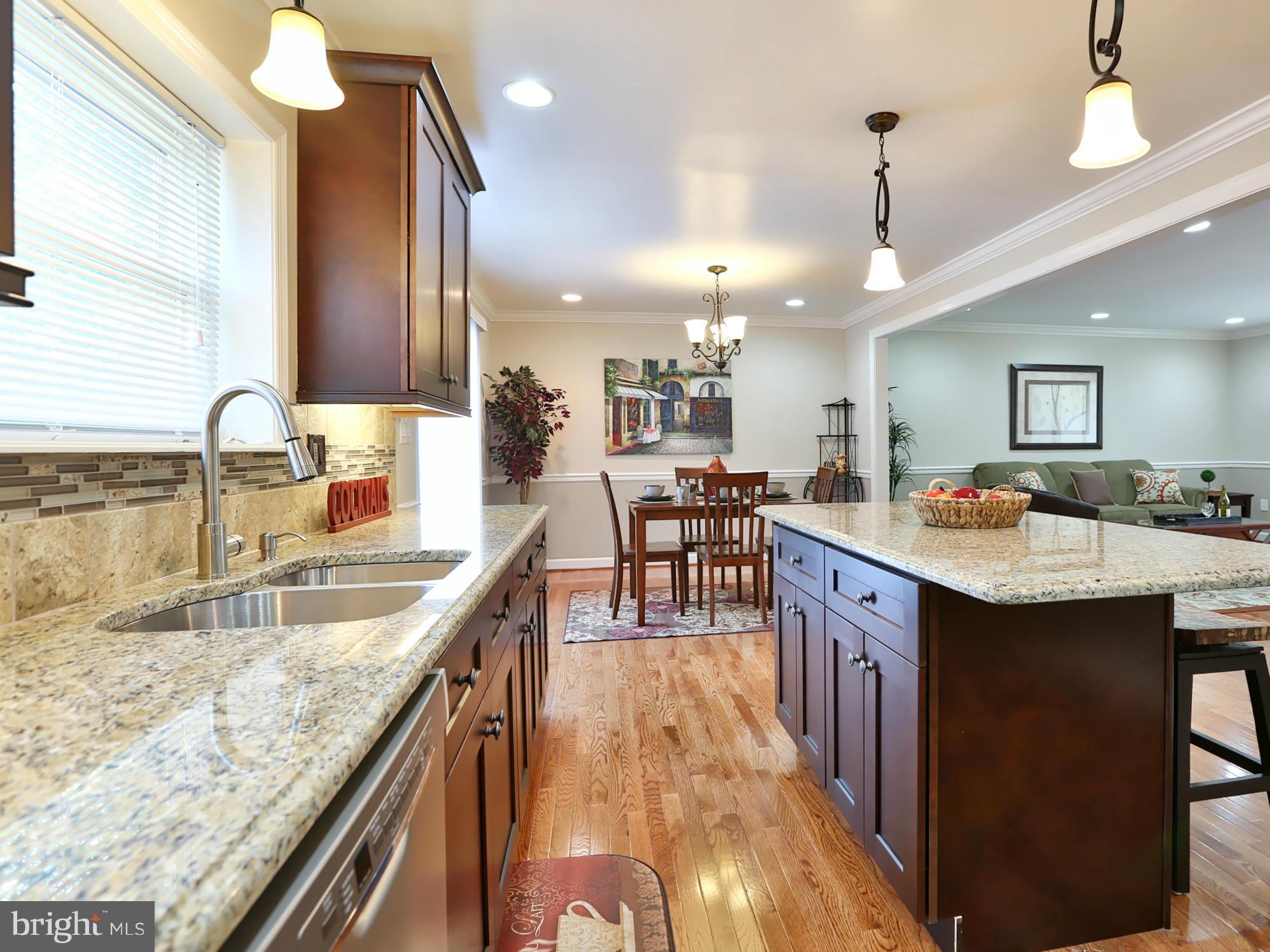 2017 Greengage Road Baltimore, MD 21244 - Photo 7 of 30 Granite Countertops And Tile Backsplash