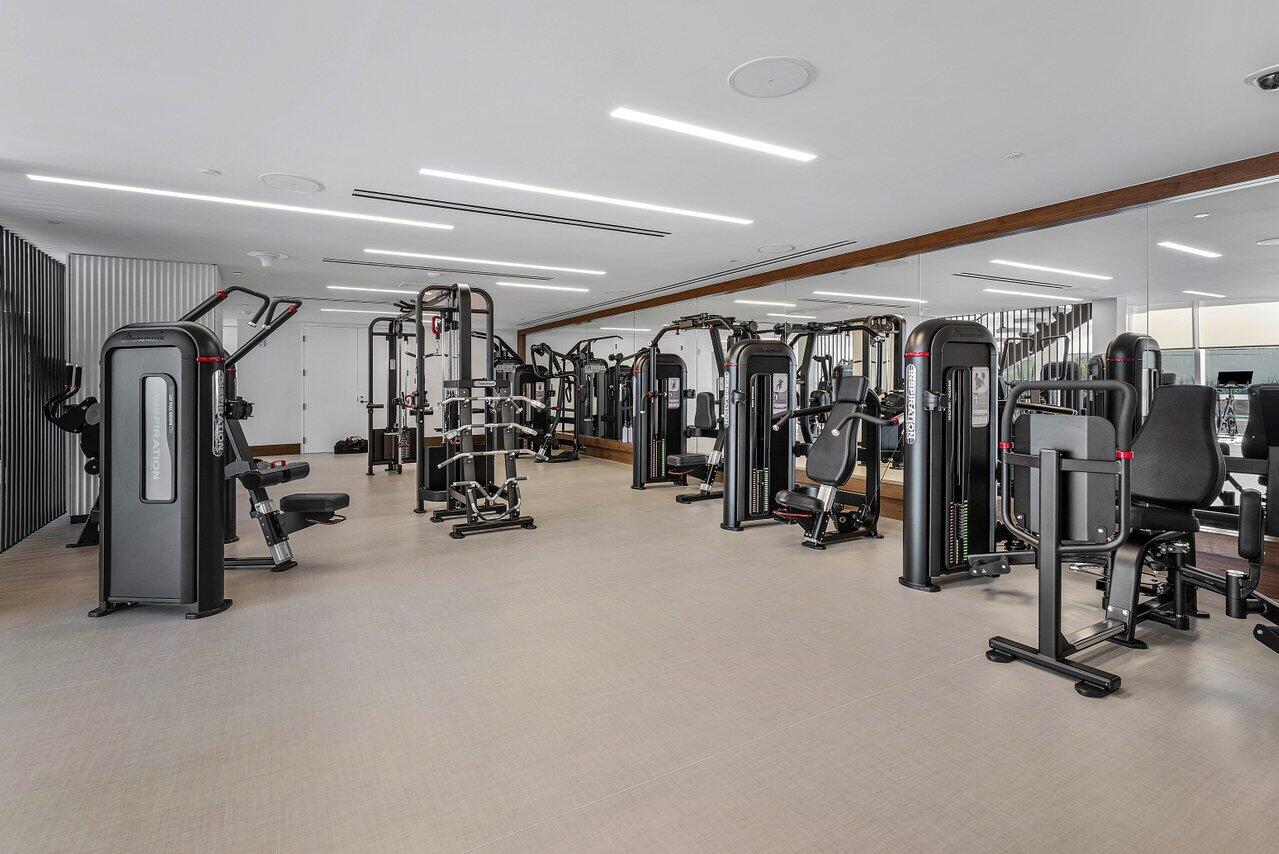 220 Southeast Mizner Boulevard, Unit 810 Boca Raton, FL 33432 - Photo 36 of 39 a view of a room with gym equipment