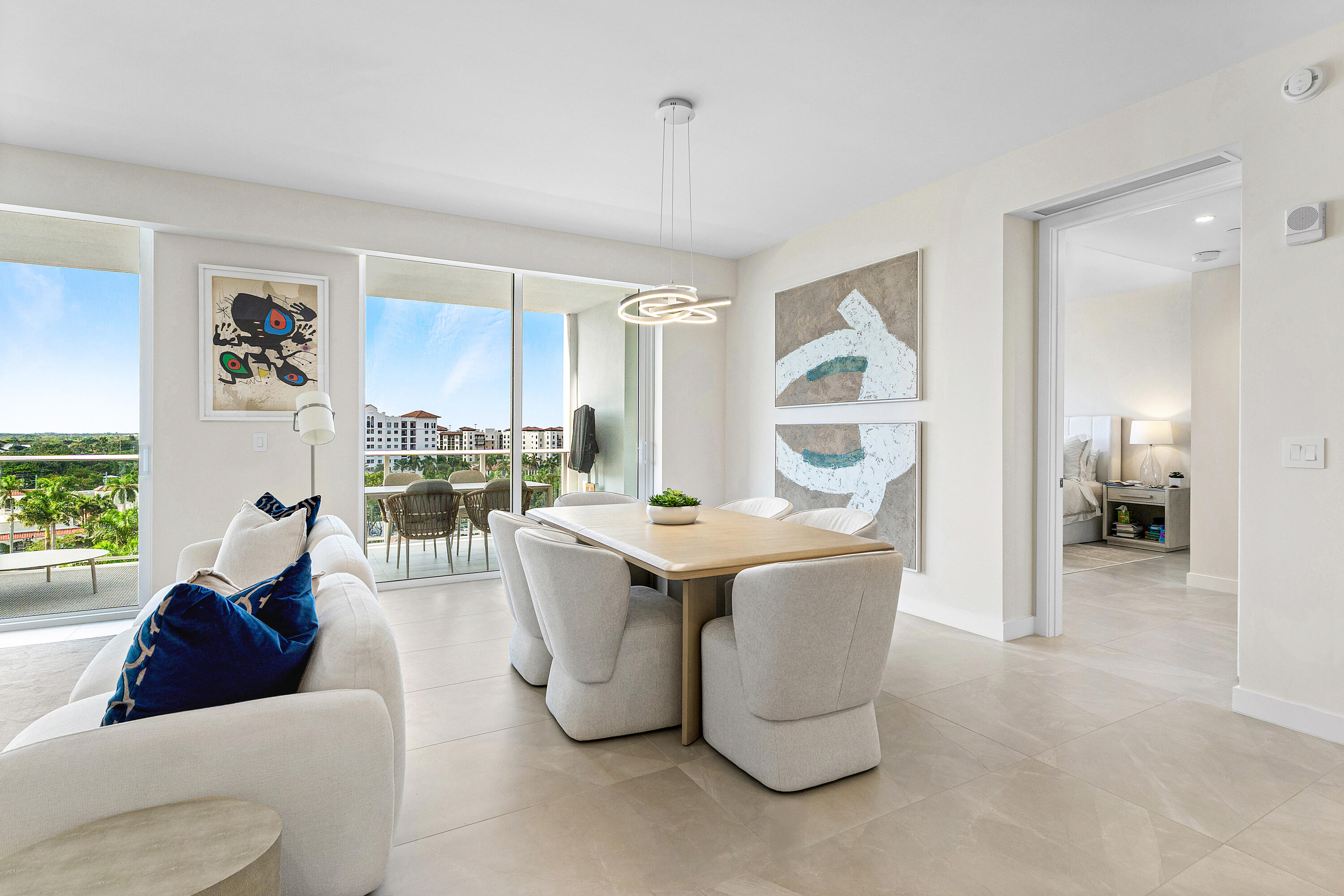 220 Southeast Mizner Boulevard, Unit 810 Boca Raton, FL 33432 - Photo 5 of 39 a living room with furniture and a large window