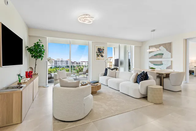 a living room with fireplace furniture and a flat screen tv