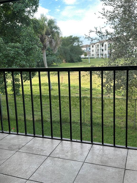 22415 Southwest 61st Way, Unit 202 Boca Raton, FL 33428 - Photo 7 of 14 a view of a balcony