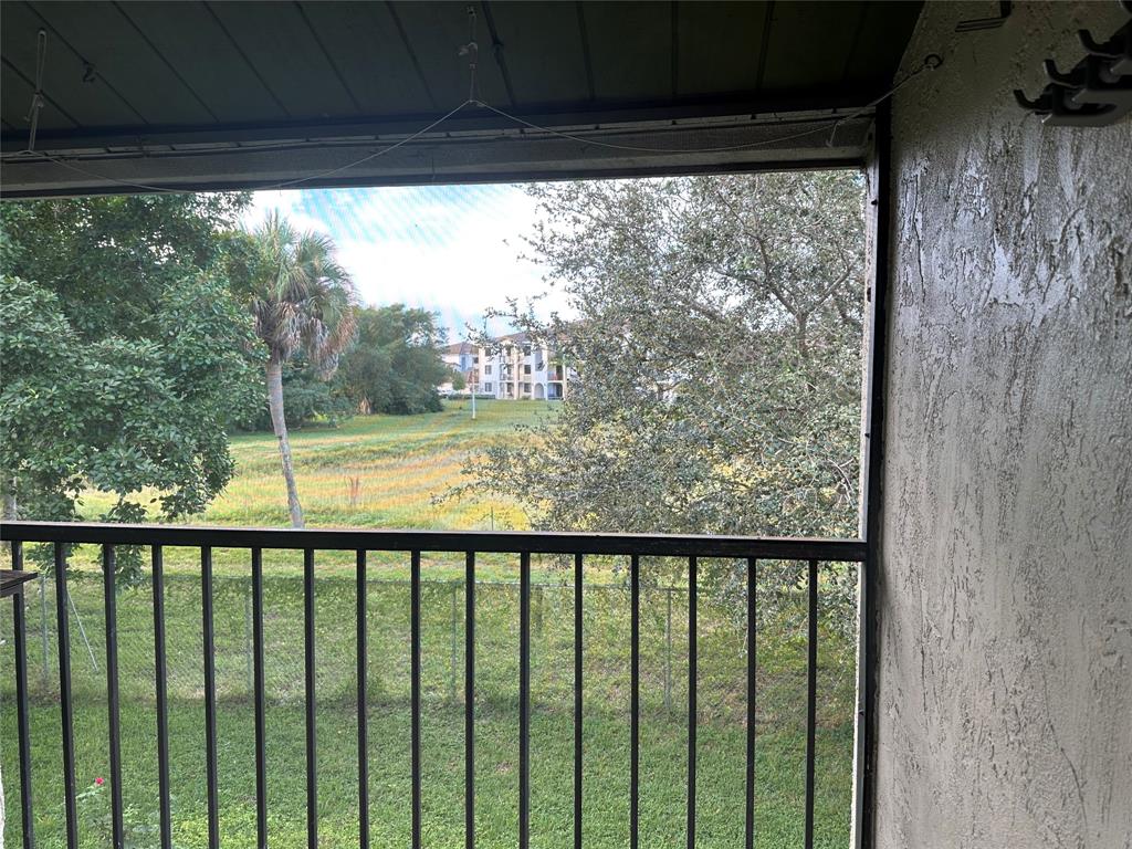 22415 Southwest 61st Way, Unit 202 Boca Raton, FL 33428 - Photo 8 of 14 a view of a porch