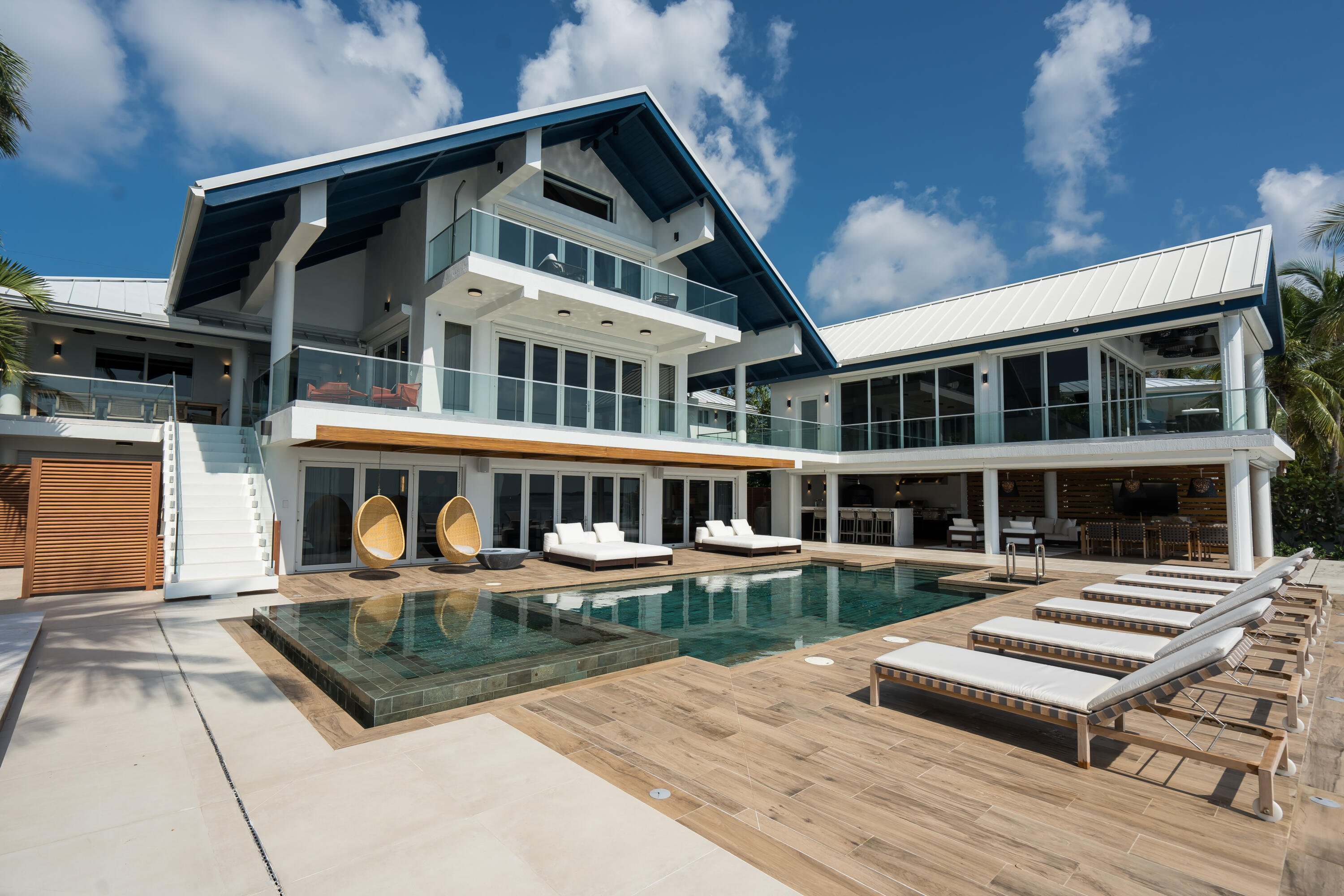 555 Ocean Cay Key Largo, FL 33037 - Photo 12 of 46 a front view of a house with yard and balcony