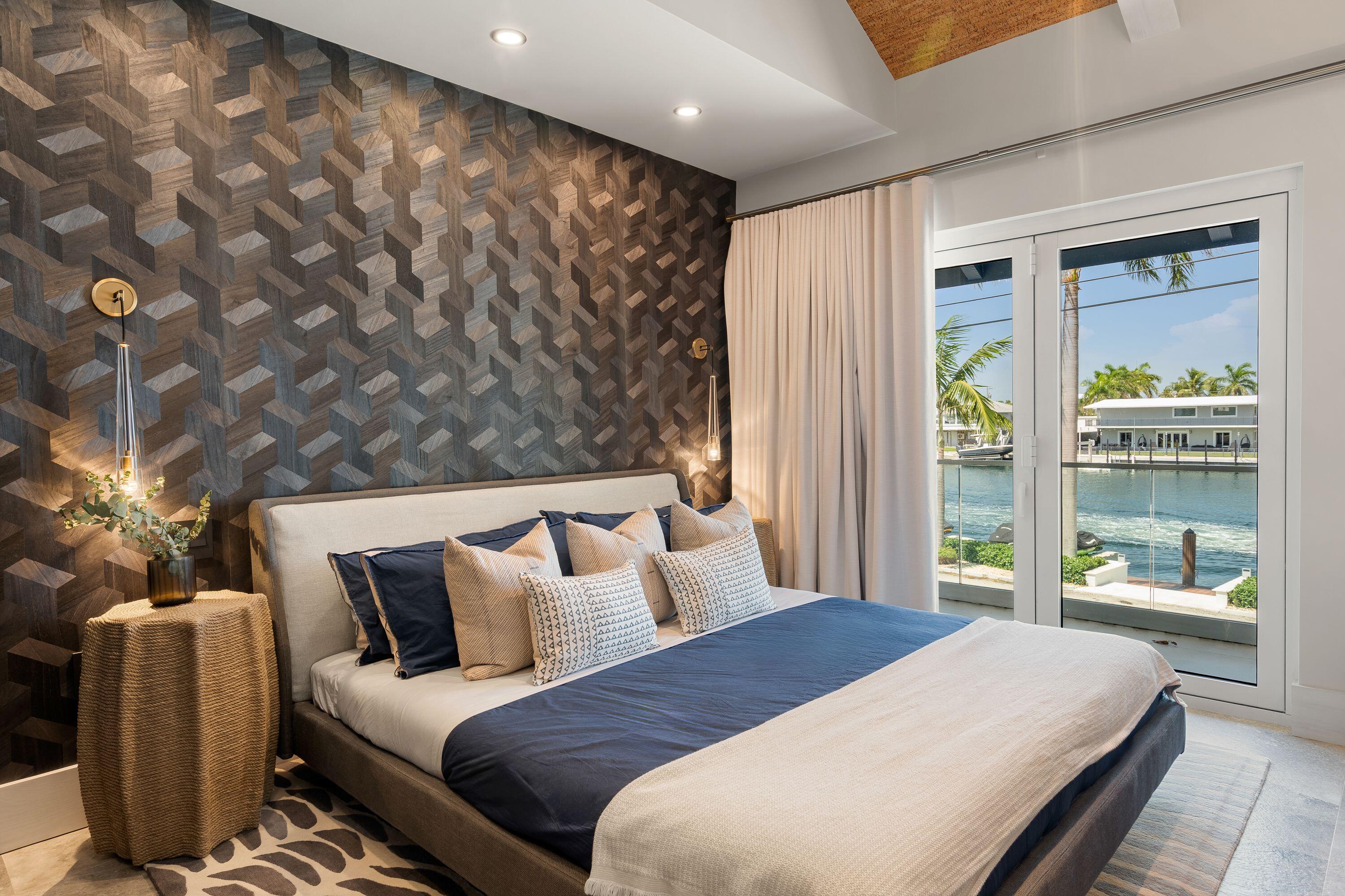 555 Ocean Cay Key Largo, FL 33037 - Photo 27 of 46 a bedroom with bed and balcony with couch