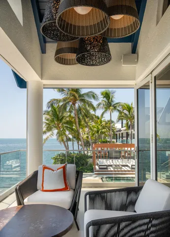 a outdoor living space with patio furniture and a potted plant