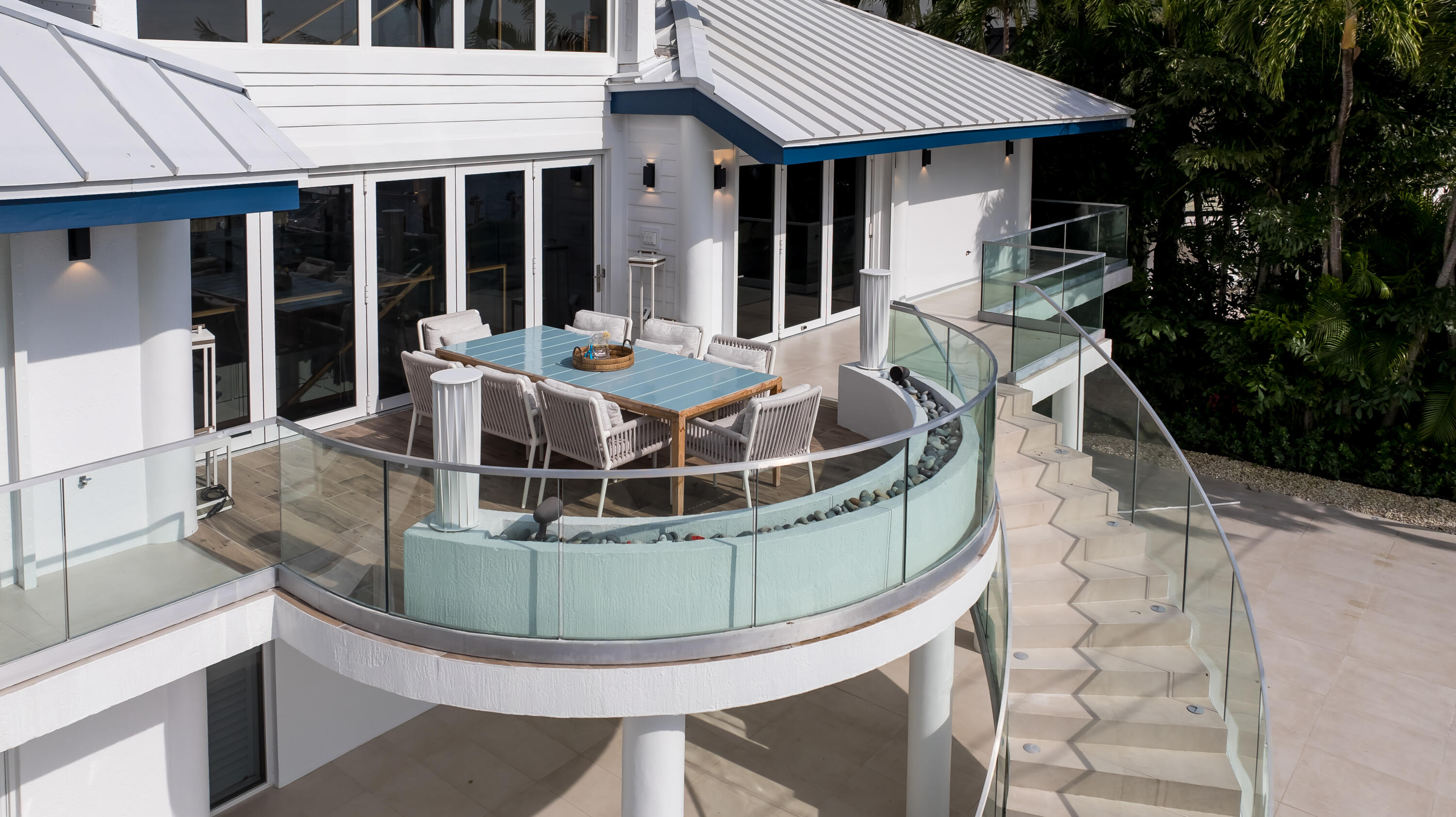 555 Ocean Cay Key Largo, FL 33037 - Photo 42 of 46 a view of a house with roof deck and couches