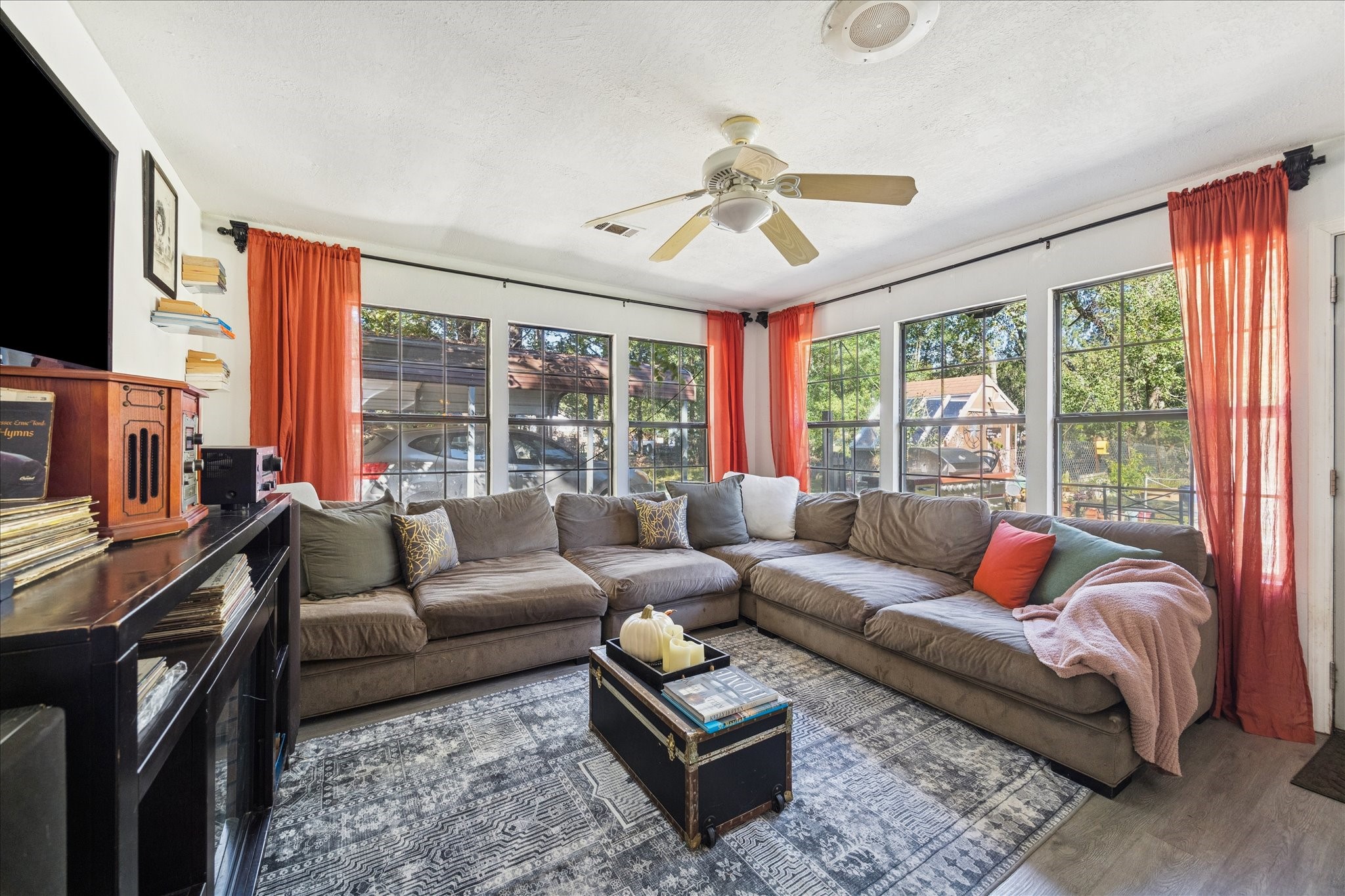 6 B Davidson Lane Huffman, TX 77336 - Photo 9 of 20 This cozy sun room features large windows that flood the space with natural light giving it a warm feel. Perfect for relaxation and entertaining.