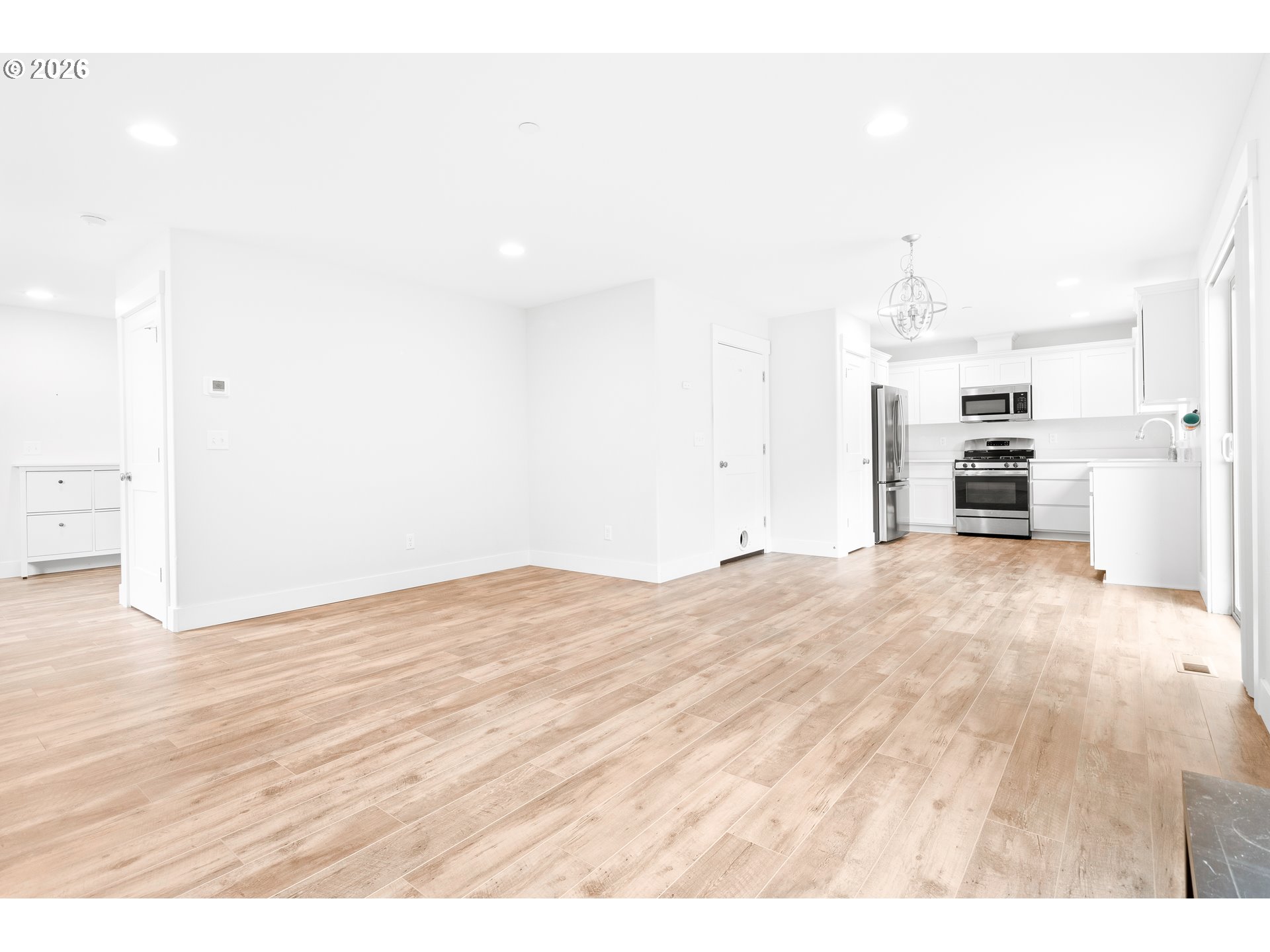 1463 Southeast Honeysuckle Loop Warrenton, OR 97146 - Photo 7 of 30 Living Room/Dining Room