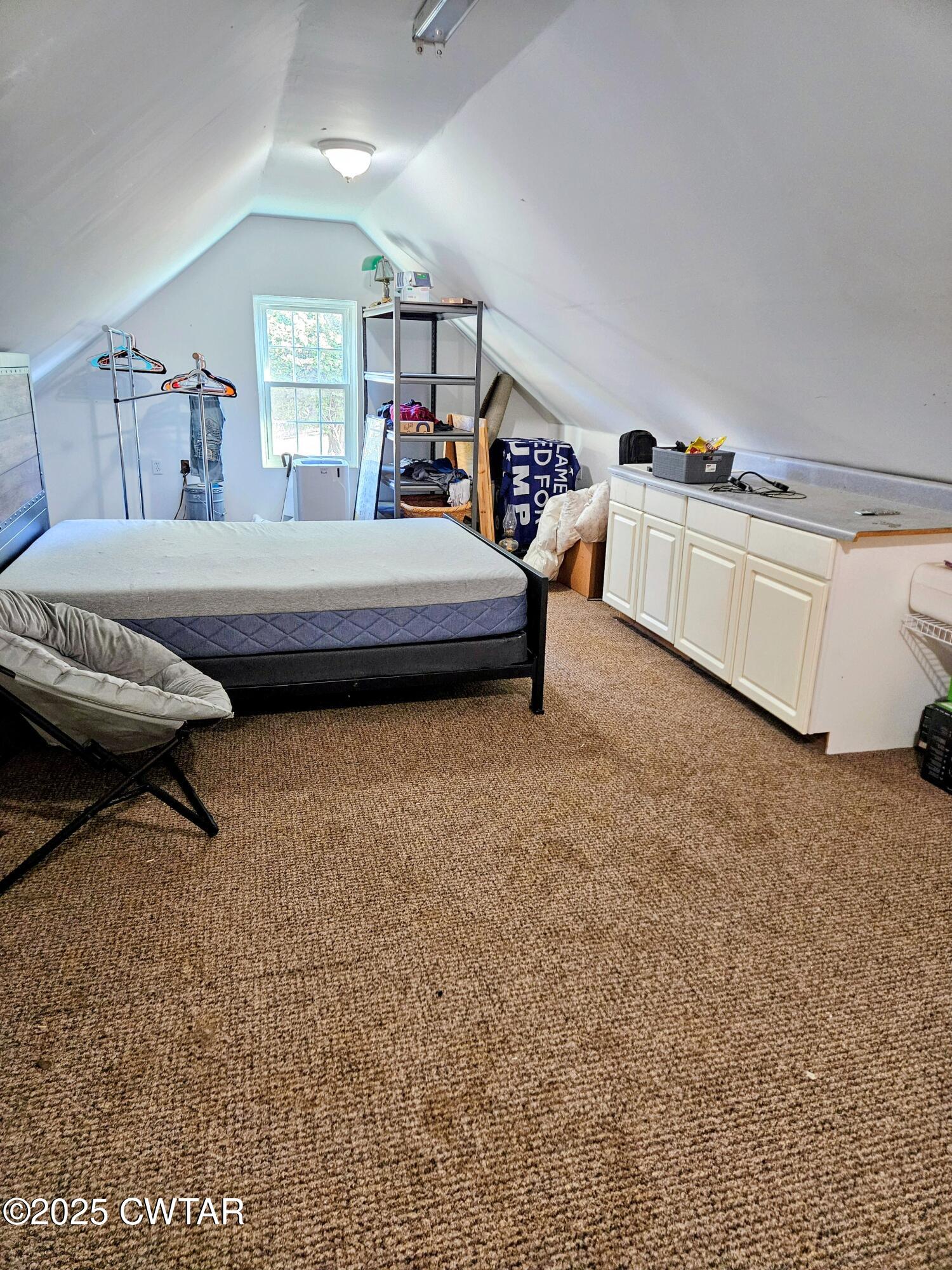 125 Hurts Chapel Road Jackson, TN 38301 - Photo 29 of 50 a bedroom with furniture and a window