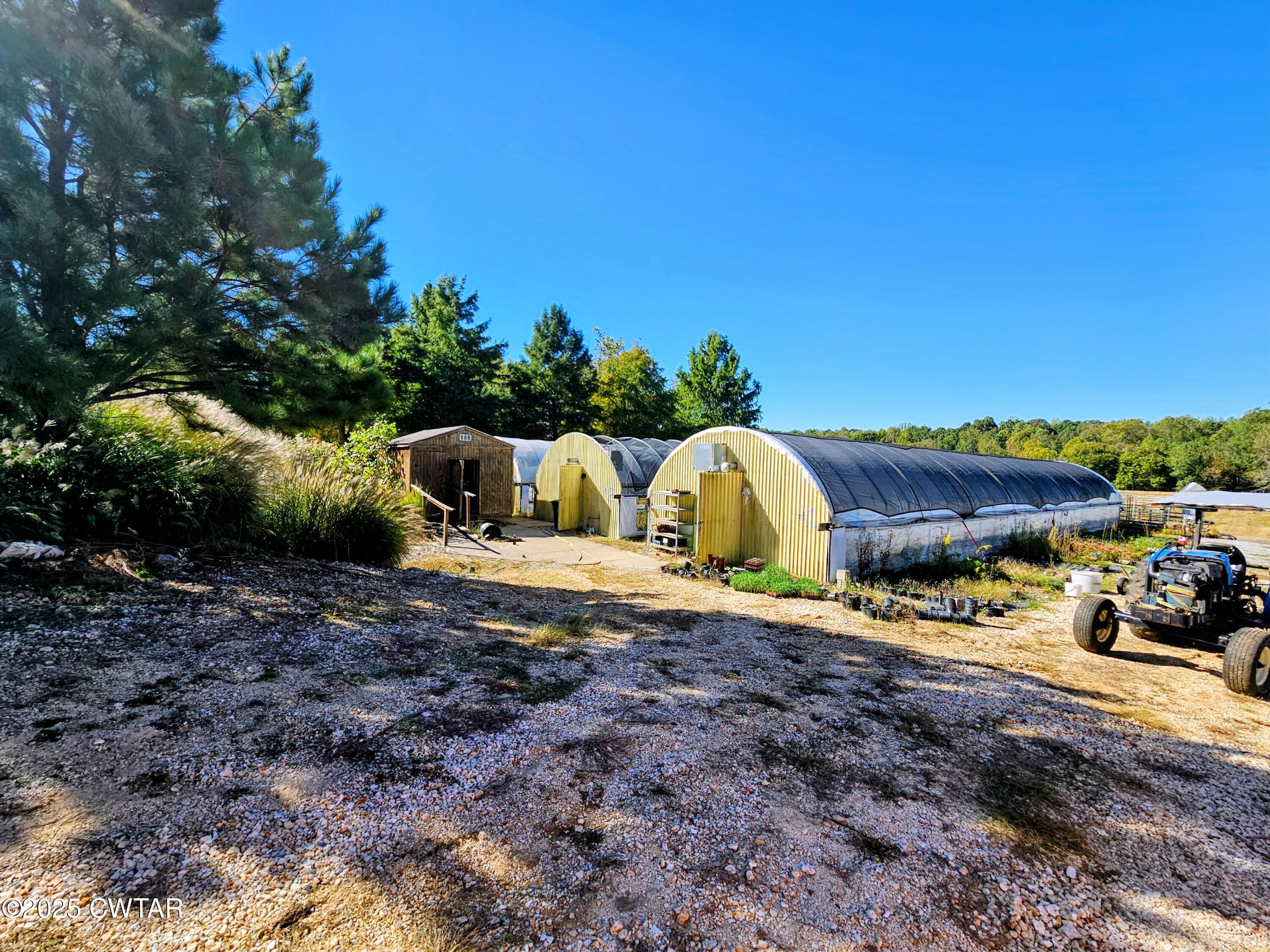 125 Hurts Chapel Road Jackson, TN 38301 - Photo 38 of 50 a view of a yard with car parked