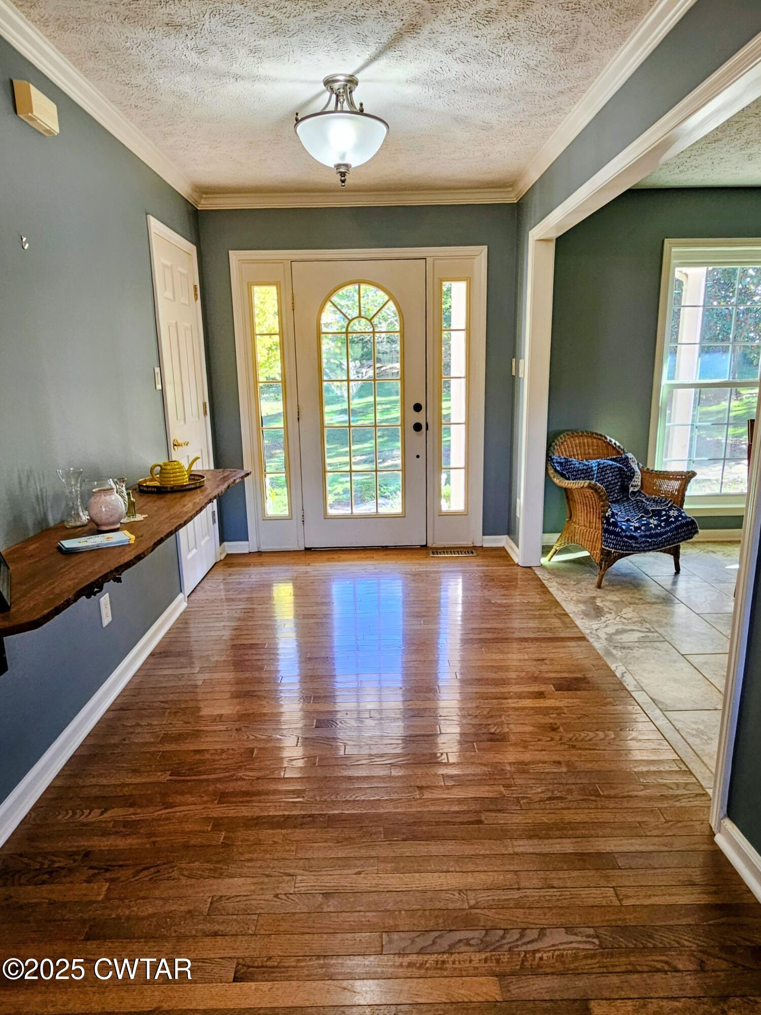 125 Hurts Chapel Road Jackson, TN 38301 - Photo 10 of 50 a living room with fireplace furniture and a large window