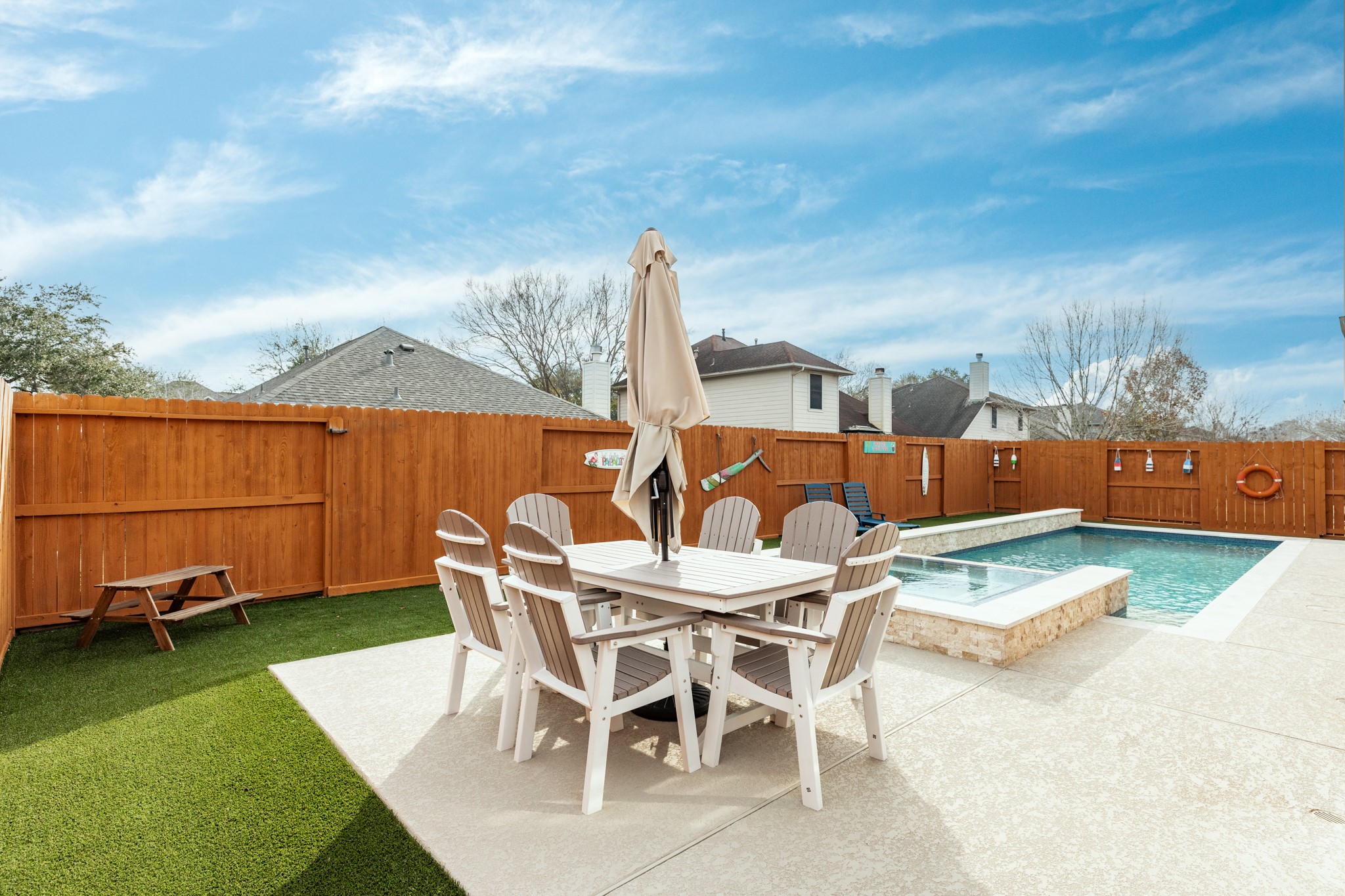 4113 Merlet Drive Pearland, TX 77584 - Photo 31 of 36 Your family and friends will love your backyard oasis. It's a perfect space for relaxation, entertainment, and creating lasting memories together.
