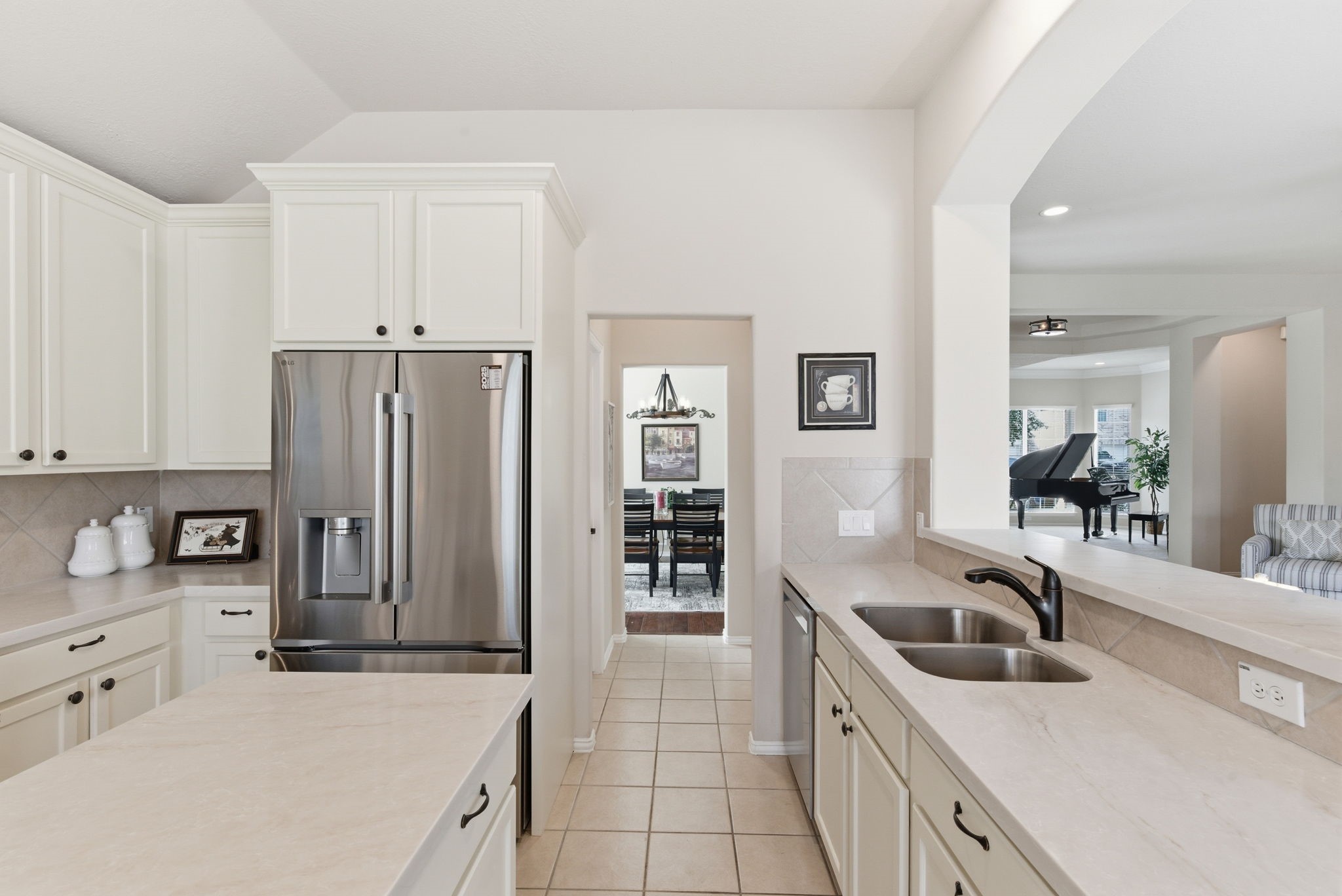 29814 Legends Pass Lane Spring, TX 77386 - Photo 24 of 46 a kitchen with stainless steel appliances granite countertop a sink stove and refrigerator