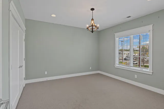 en empty room with windows