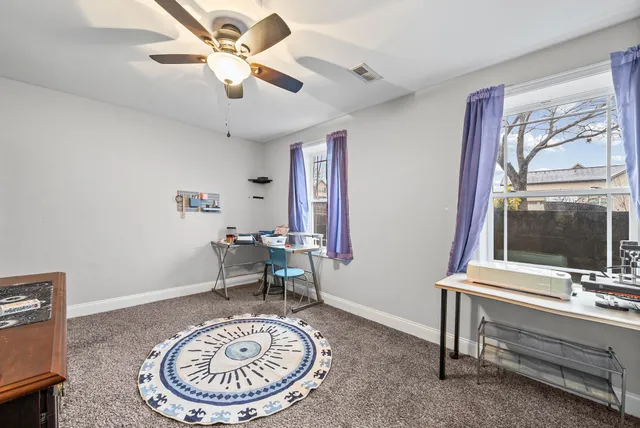 a view of workspace with a flat screen tv