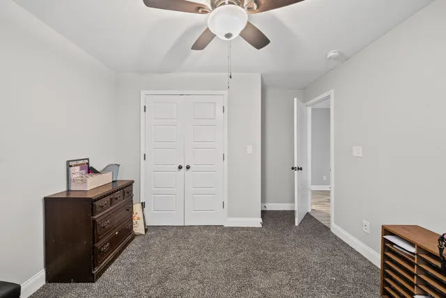 a view of a balcony with furniture