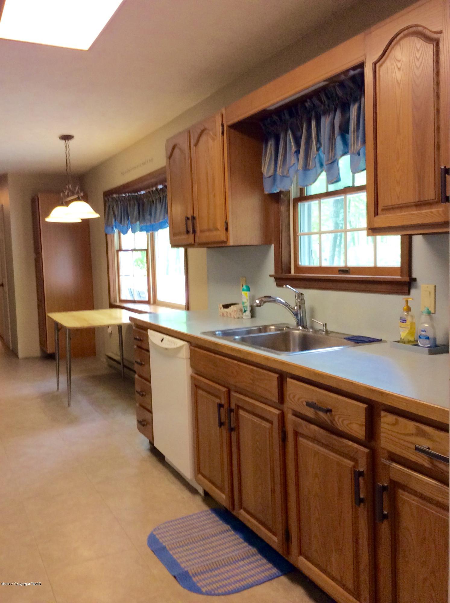 2125 Laurel Ridge Road East Stroudsburg, PA 18302 - Photo 15 of 54 a kitchen with sink cabinets and window