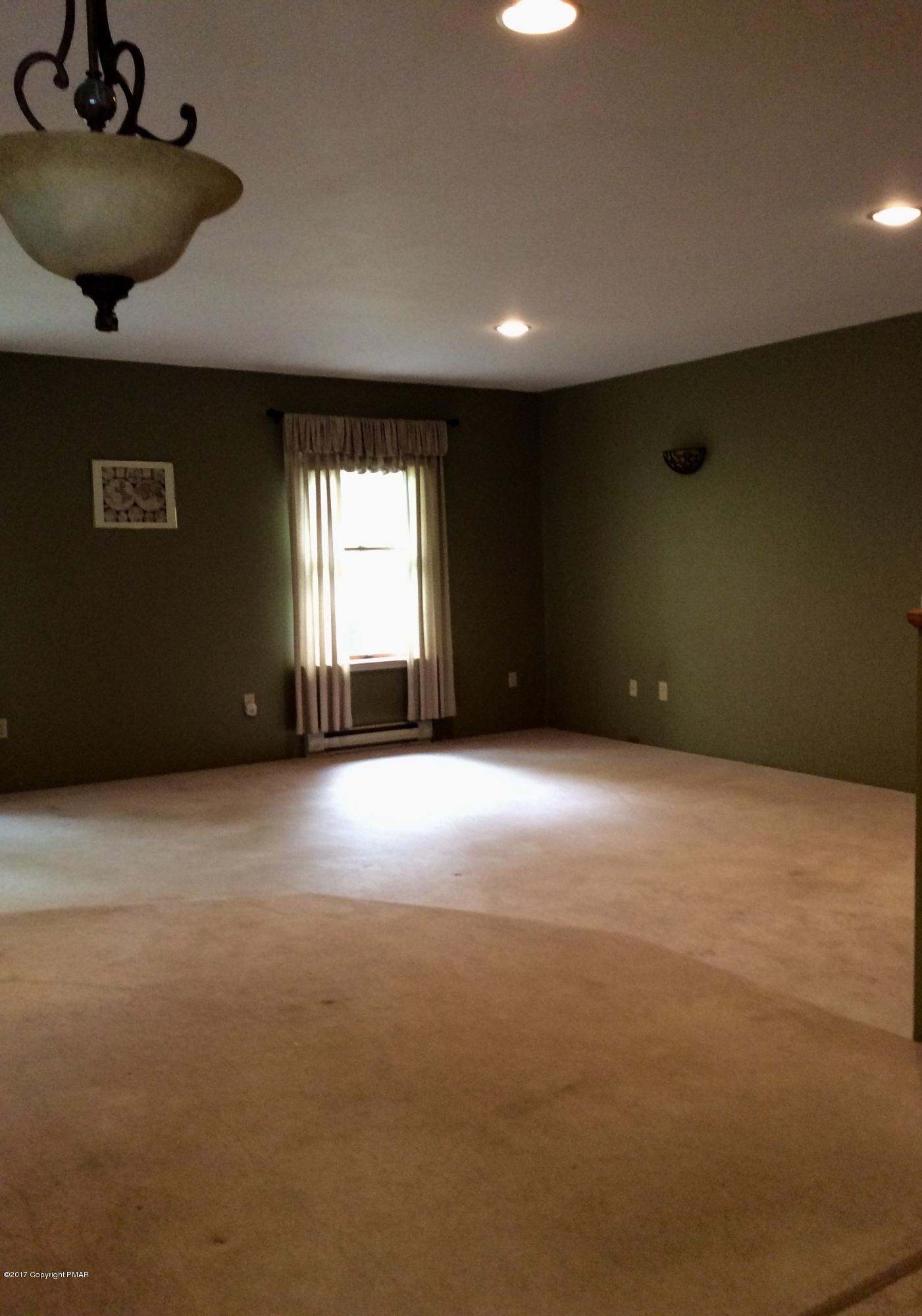 2125 Laurel Ridge Road East Stroudsburg, PA 18302 - Photo 24 of 54 a view of an empty room with a window