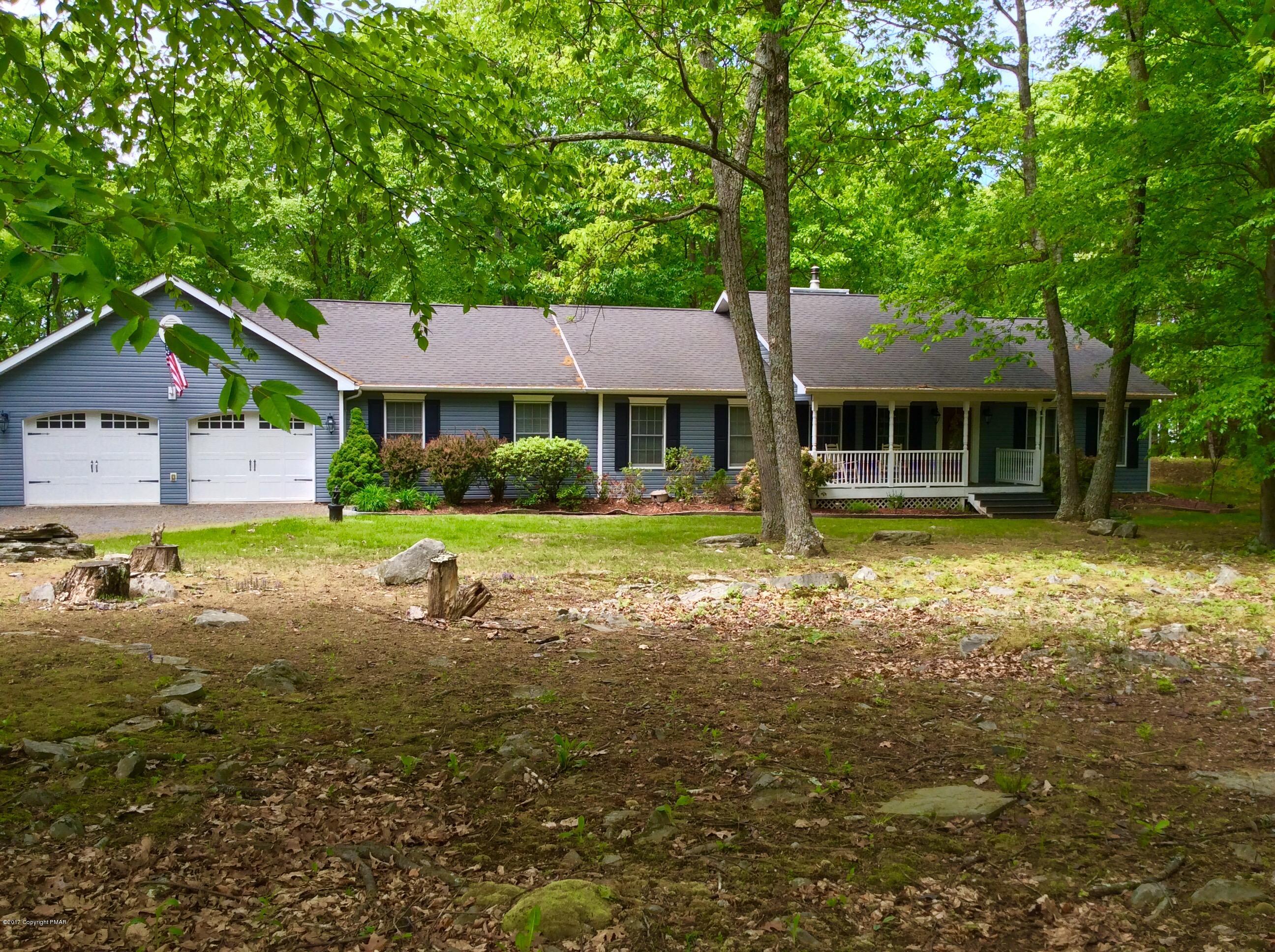 2125 Laurel Ridge Road East Stroudsburg, PA 18302 - Photo 3 of 54 a front view of a house with a yard