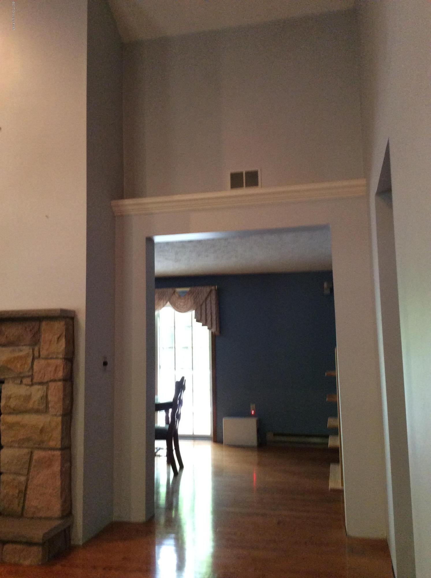 2125 Laurel Ridge Road East Stroudsburg, PA 18302 - Photo 54 of 54 a view of empty room with wooden floor and fan