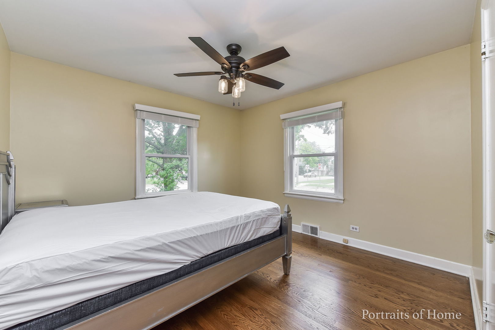 602 North President Street Wheaton, IL 60187 - Photo 8 of 16 a bedroom with a bed and window