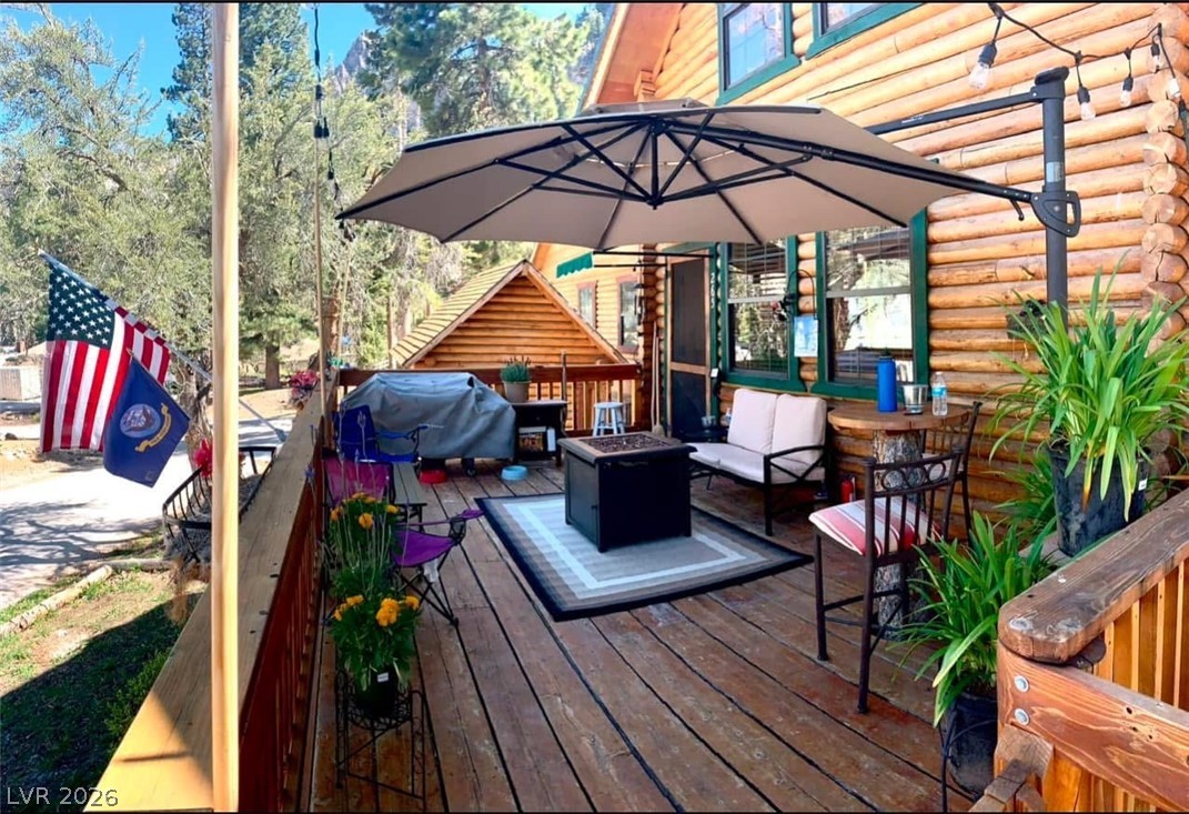 265 Rim Road Mount Charleston, NV 89124 - Photo 3 of 5 Spacious deck and fully fenced yard. Pet friendly.