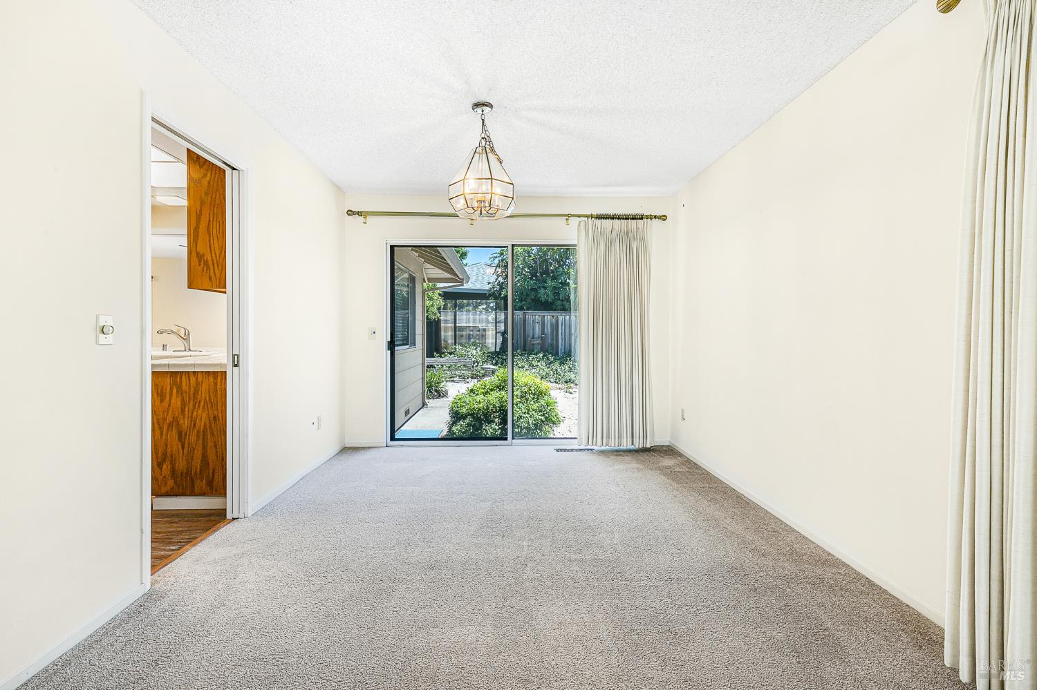 138 Oak Shadow Drive Santa Rosa, CA 95409 - Photo 14 of 50 a view of a room with large windows