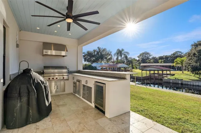 a view of a livingroom with furniture and staircase