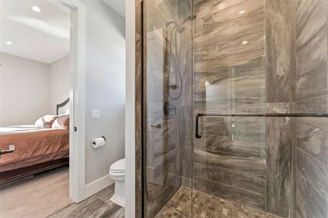 a bathroom with double sink and a mirror