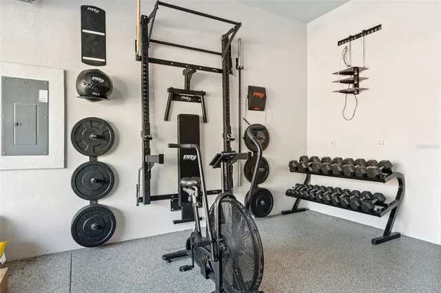 a dinning table and chairs in the garden