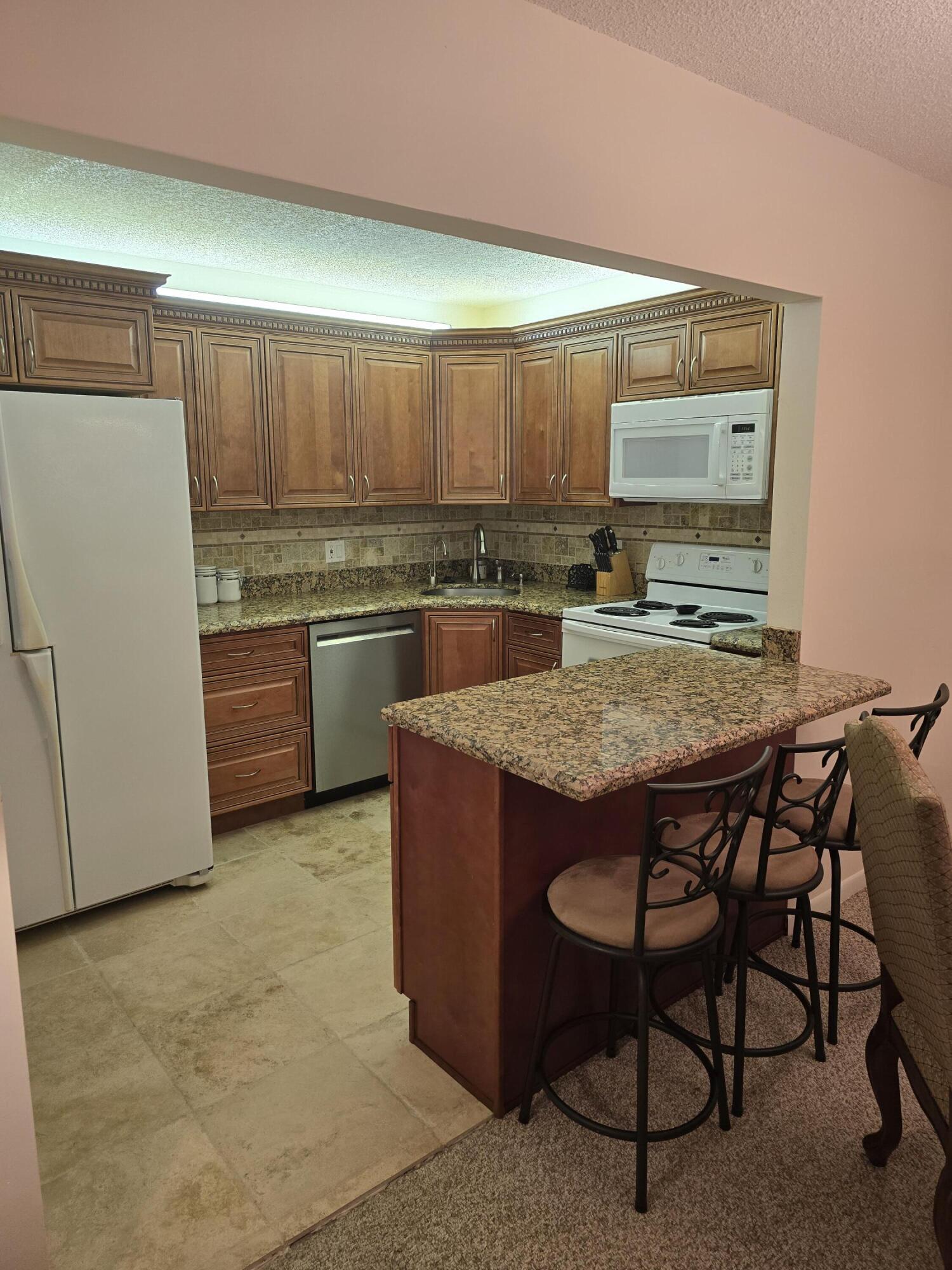317 Pine Ridge Circle Greenacres, FL 33463 - Photo 4 of 51 kitchen bar