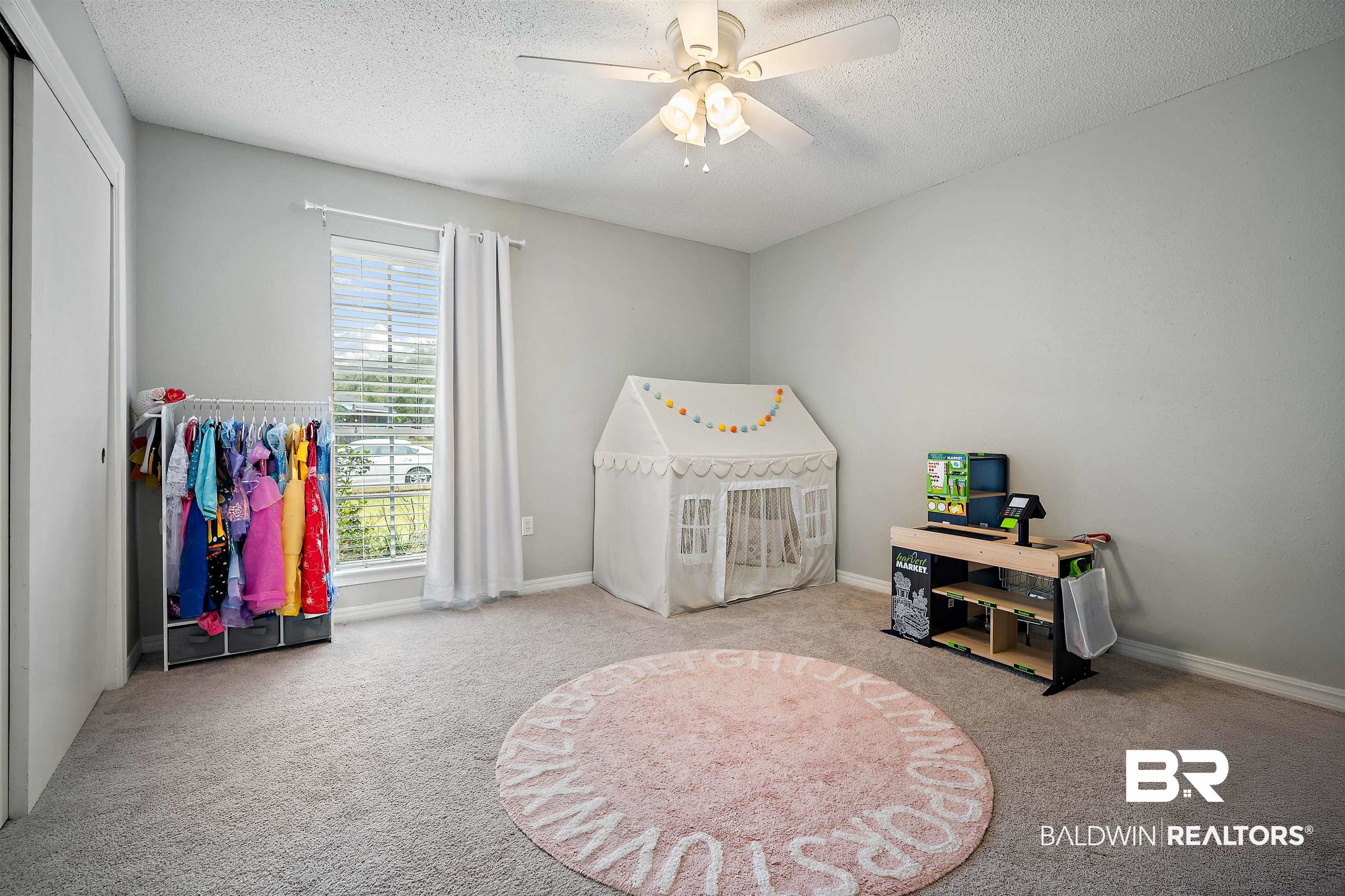 4228 Spring Valley Drive South Mobile, AL 36693 - Photo 19 of 31 Bedroom with light carpet, a textured ceiling, and ceiling fan