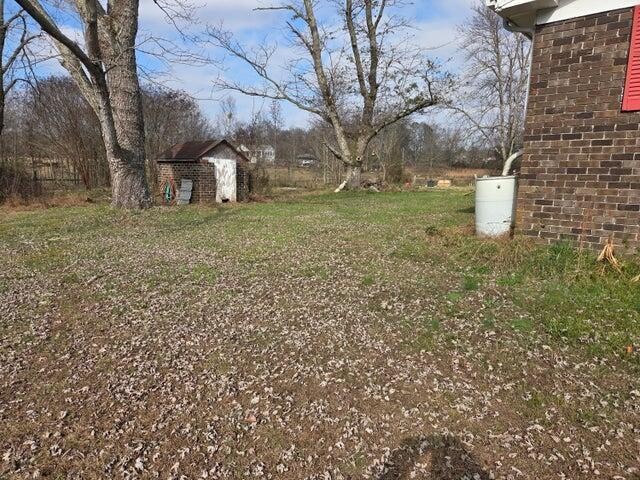 2596 Keith Valley Road Southeast Cleveland, TN 37323 - Photo 4 of 24 a view of a backyard with large trees